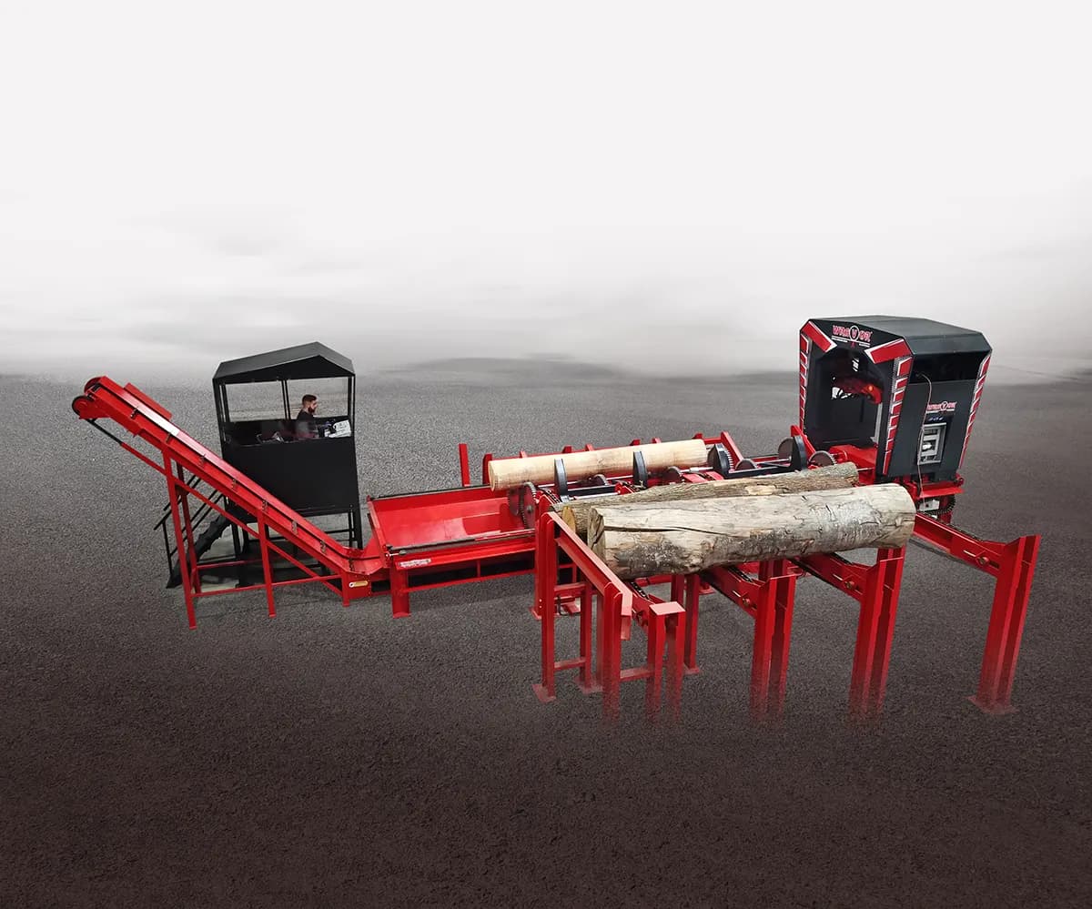 Wravor debarking line with inclined infeed, logs on a cross deck and operator cabins