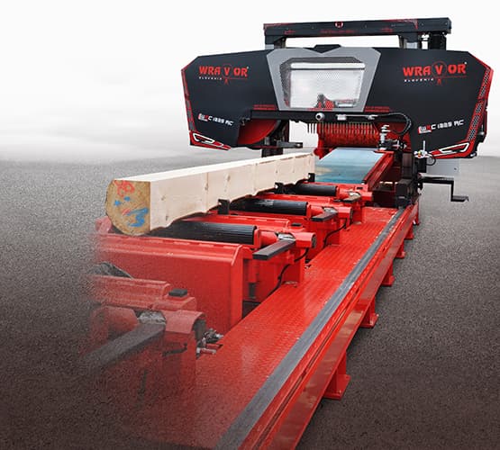 Wravor WRC 1225 AC saw head at the end of its rails holding a squared timber